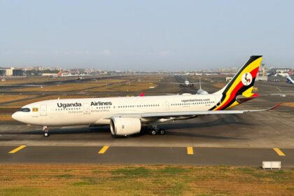 A Uganda Airlines B787 circling the runway.