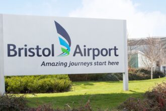 Sign to Bristol Airport. Reads: Amazing journeys start here.
