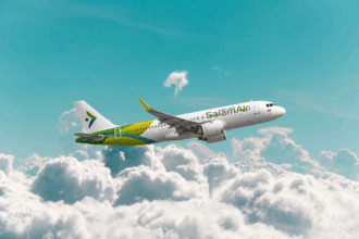 SalamAir Airbus A320 flying above the clouds.
