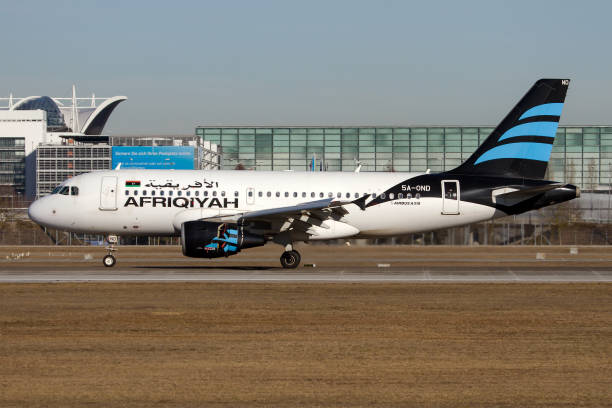An Afriqiyah Airways Airbus 319 seen bringing the Libyan delegation back home after the Munich Security Conference.