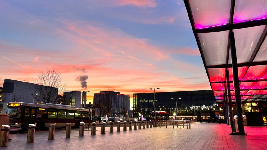 Heathrow Terminal 3 from outside during sunset.