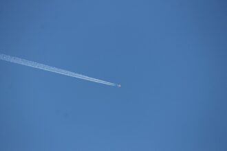 airliner flying in clear skies