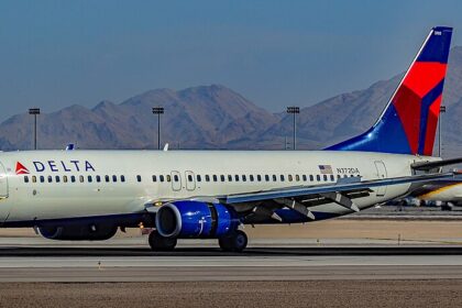 This image depicts an aircraft taxiing in the runway