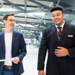 An picture of two young men working for Air Canada