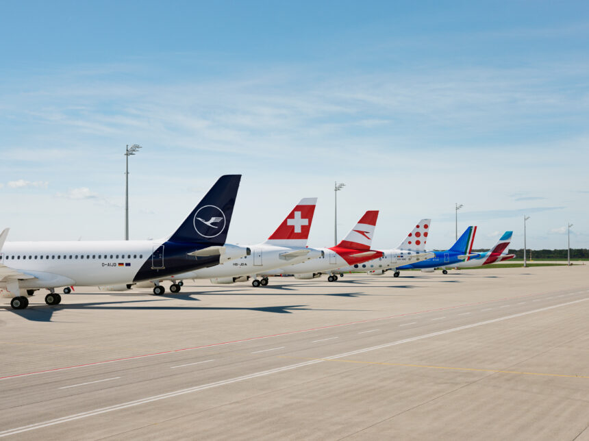 A lineup of aircraft tails from the Lufthansa Group: Lufthansa, SWISS, Austrian Airlines, Brussels Airlines, ITA Airways and Eurowings.