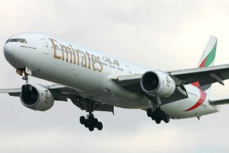Emirates Airline Boeing 777-31H in flight