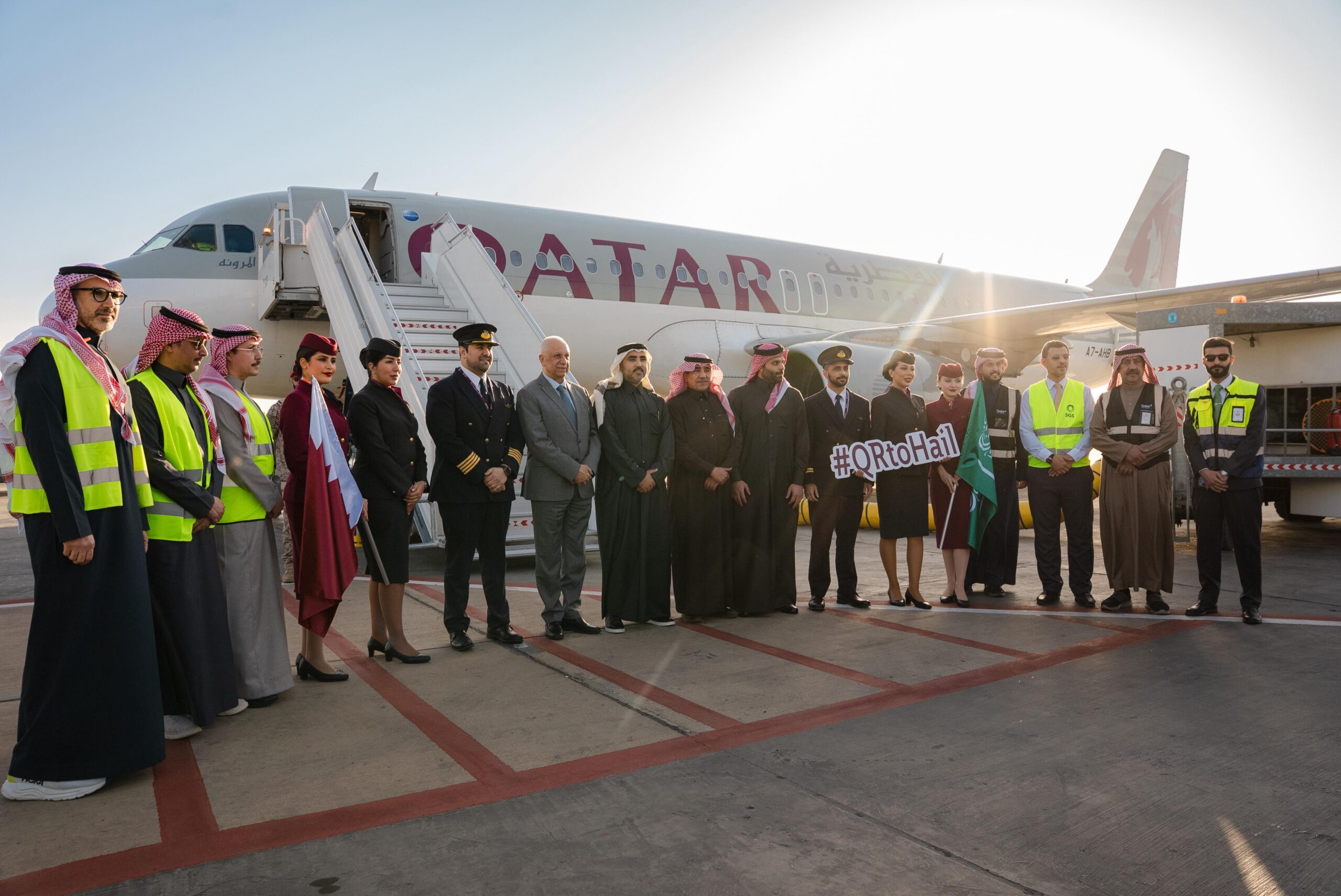 Qatar Airways staff gather around inaugural flight to Hail