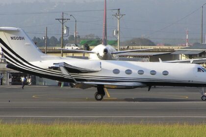 White Gulfstream III aircraft on the runway tarmac before take off.