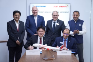 Captain Basil Kwauk, COO Air India and Samir Sahgal, Deputy Vice President, Commercial Services Sales sign the agreement
