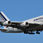 Air France A380 aircraft flying in the blue sky.