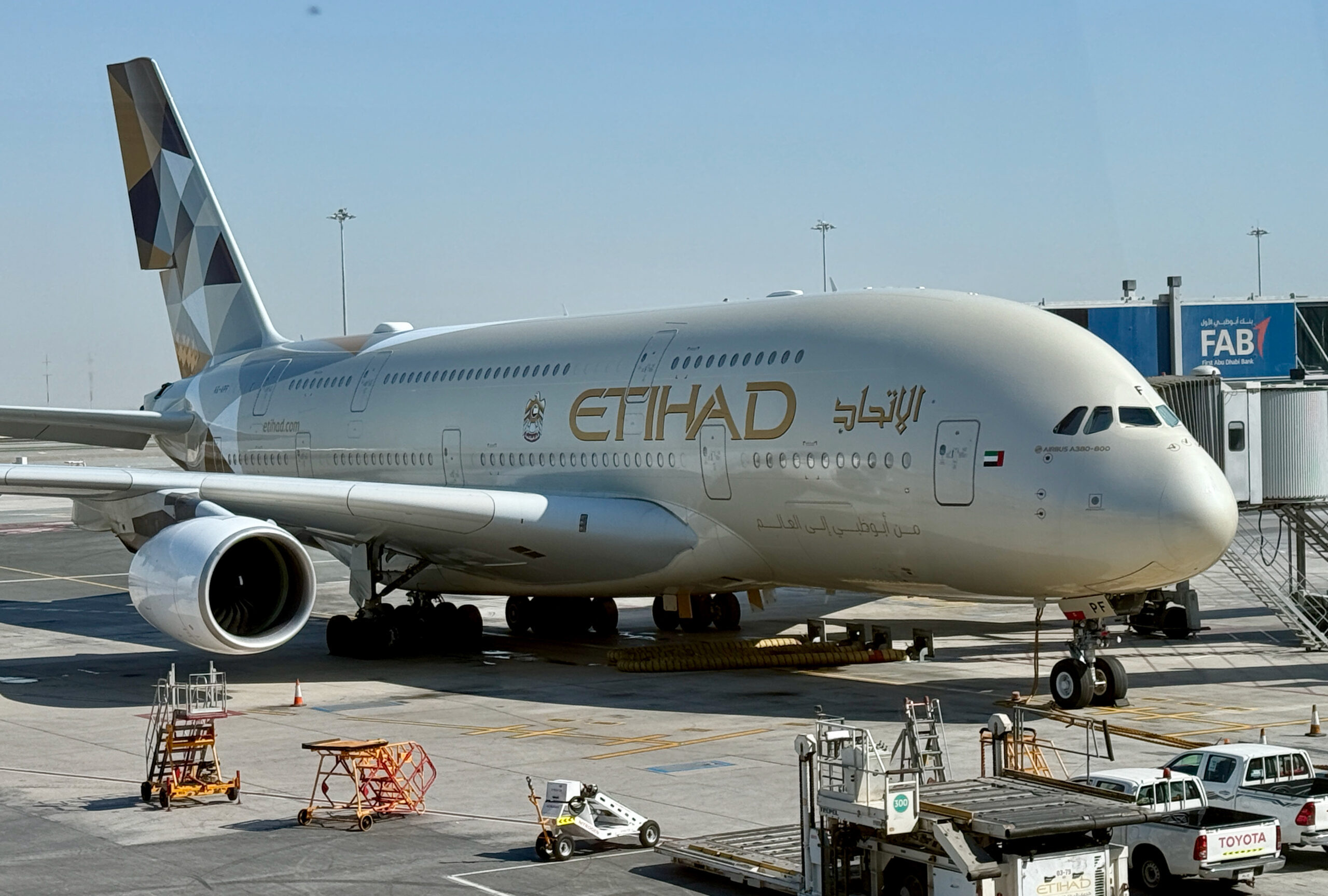 Etihad Airways jet parked at a terminal
