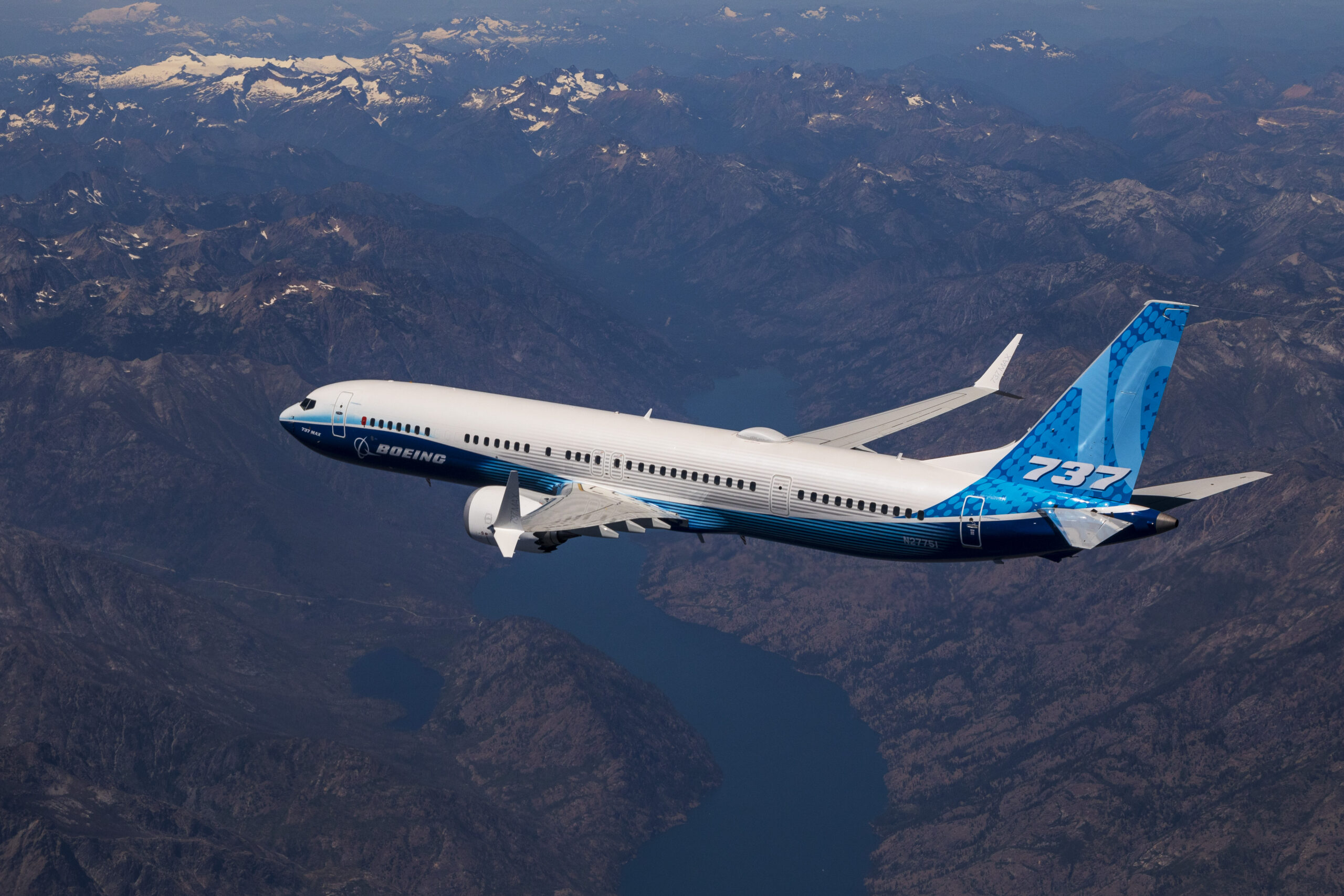 A Boeing 737-10 passenger aircraft in flight, the largest variant of the 737 MAX family.