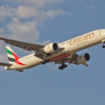 An Emirates Boeing 777-300ER aircraft in flight. It is a part of the retrofit programme.