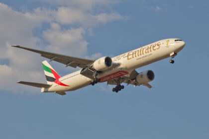 An Emirates Boeing 777-300ER aircraft in flight. It is a part of the retrofit programme.
