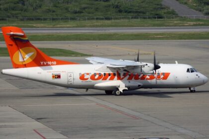 Airplane parked at Caracas Simón Bolívar International Airport. Venezuela airspace closure triggers flight disruptions across the Carribean