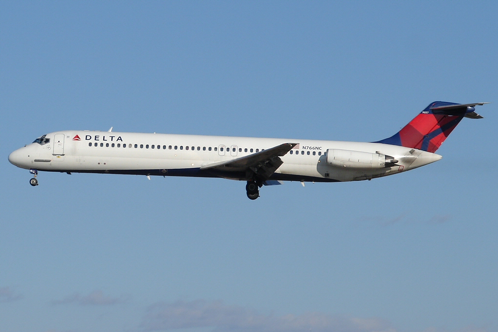 Delta Air Lines aircraft against a blue sky