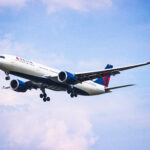 Delta Air Lines aircraft in flight, representing one of the US airlines featured in coverage of US airline stocks 2026 and airline stocks.