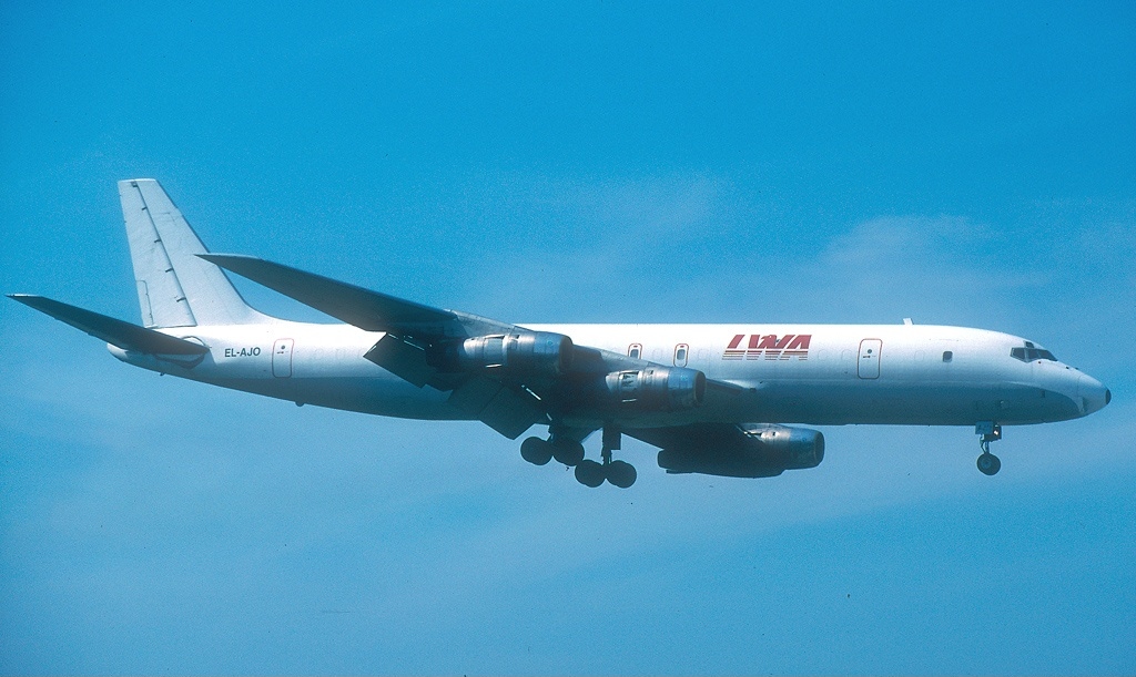 A Liberia World Airways DC-8 aircraft in flight, illustrating historical operations in the Liberia aviation sector ahead of Roberts International Airport upgrades under the Liberia civil aviation modernisation plan and Liberia aviation modernisation plan 2025-2045 to improve Liberia aviation safety standards.