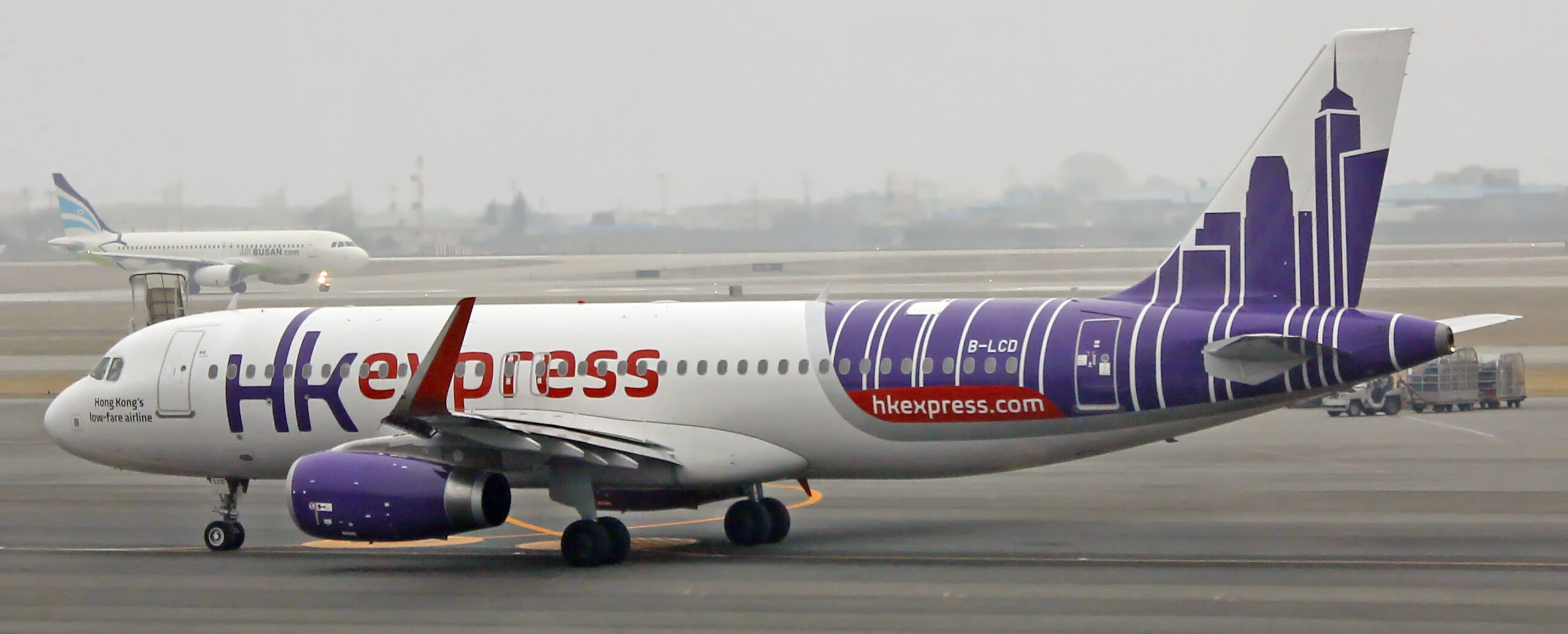 HK Express jet featured purple livery on tail