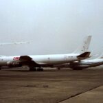 A parked jet aircraft previously operated by Liberia Airways on an airport apron, illustrating the history of the Liberia civil aviation modernisation plan, Liberia aviation sector challenges, and the legacy behind Roberts International Airport upgrades under the Liberia aviation modernisation plan 2025–2045 and Liberia aviation safety standards.