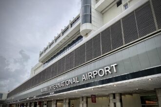 Exterior of Miami International Airport showing the terminal entrance.