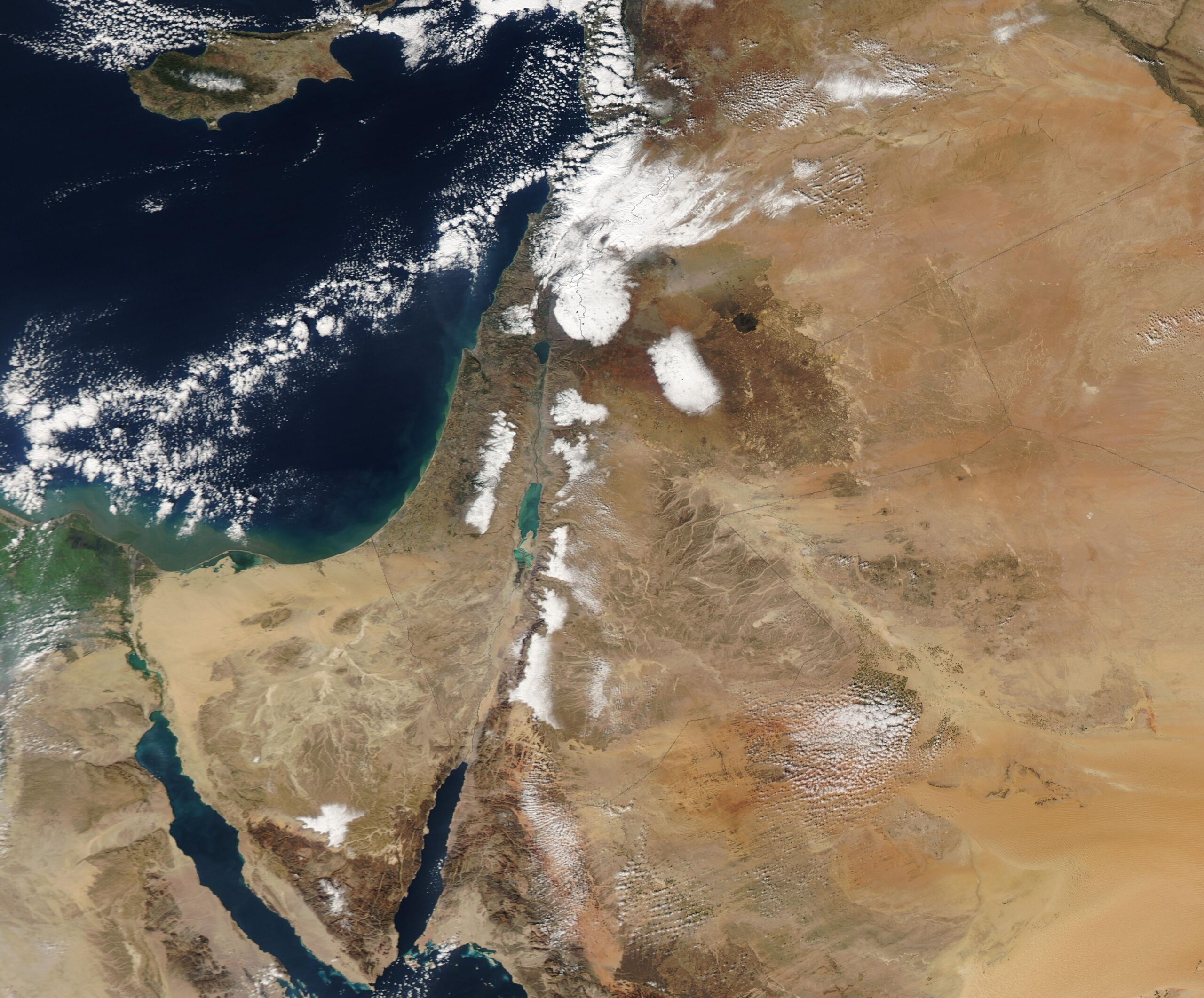 Satellite view of the Middle East showing regional geography and airspace corridors, illustrating airline geopolitical risk, flight suspensions and airspace closures as airlines avoid conflict zones.