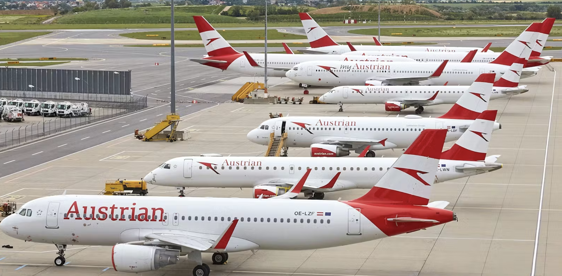 Multiple Austrian Airlines Aircraft in a Hangar 