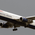 British Airways Taking Off In grey clouds