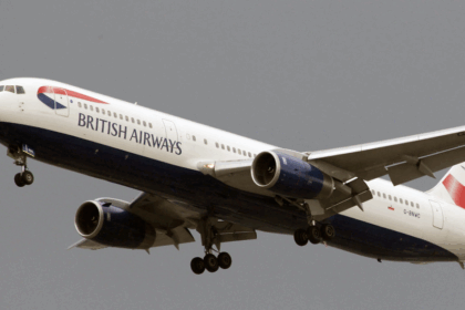 British Airways Taking Off In grey clouds