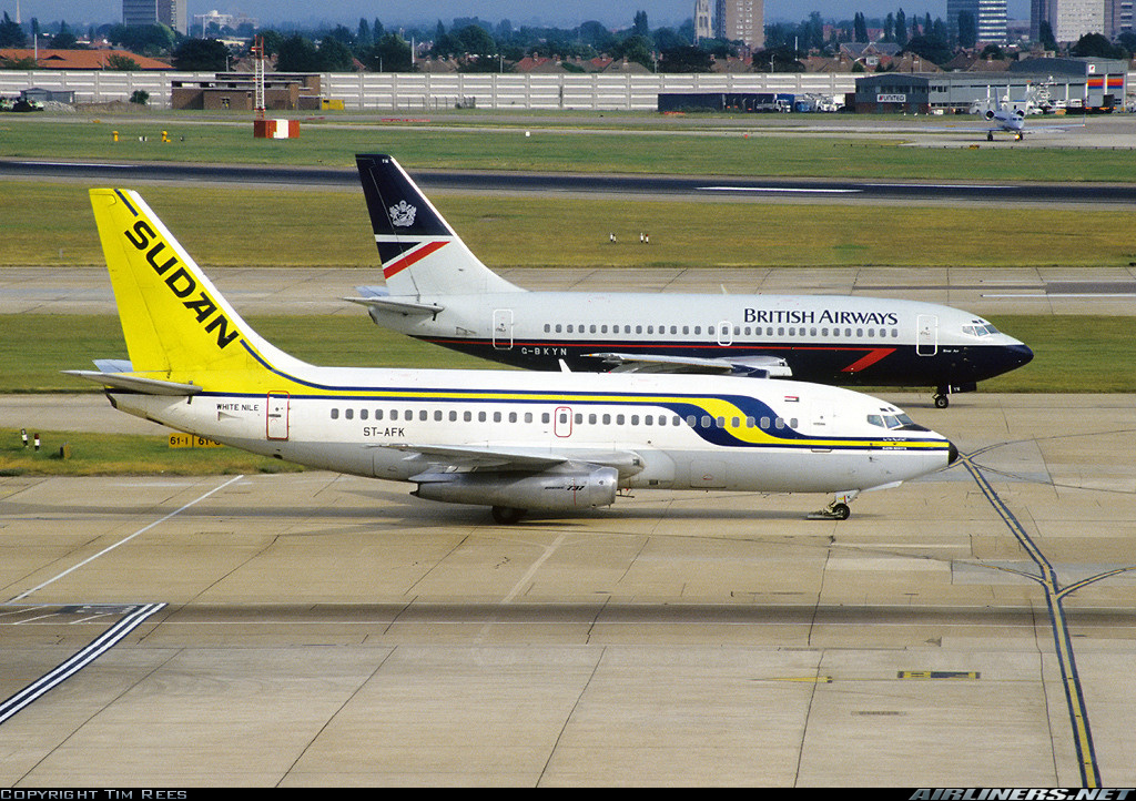 Two vintage narrow-body jets parked on a tarmac. In the foreground is a Sudan Airways Boeing 737 named 
