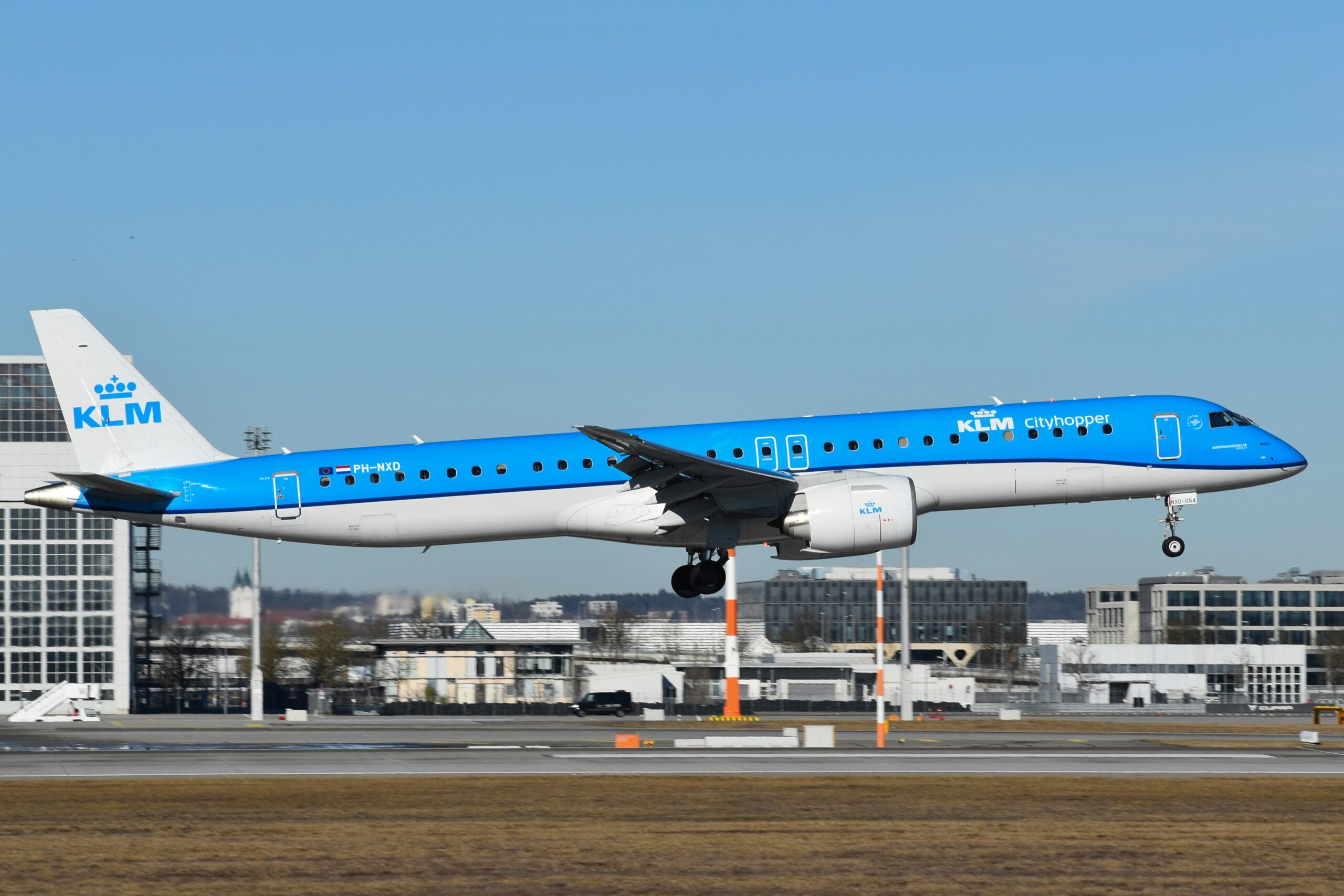 Blue and White KLM E195-E2 arriving in Munich