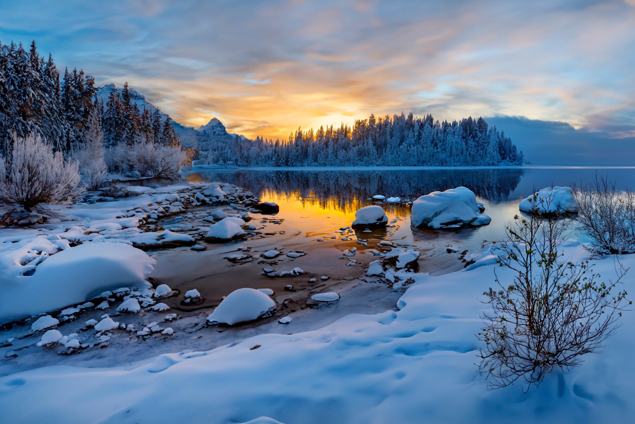Winter sunrise over a frozen landscape in central Finland
