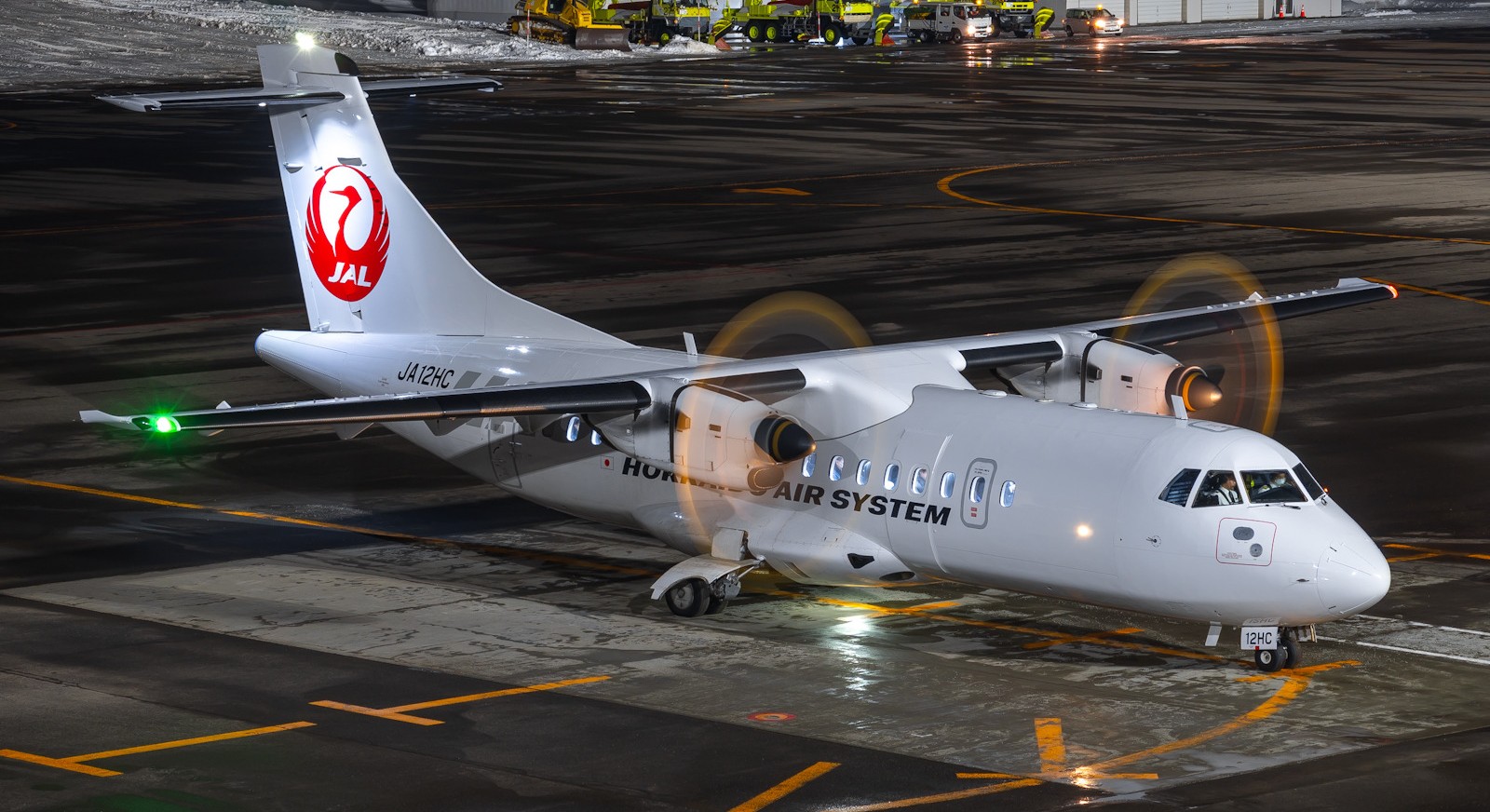 HAC aircraft on the runway in the dark, before flight.