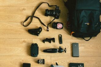 Passport, Camera, Backpack and a Cat lying on the Floor
