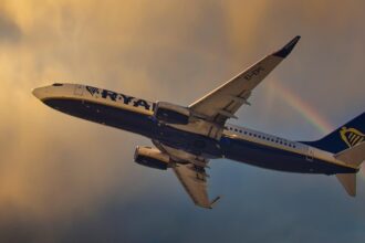 A Ryanair Boeing 737-8AS aircraft in flight.