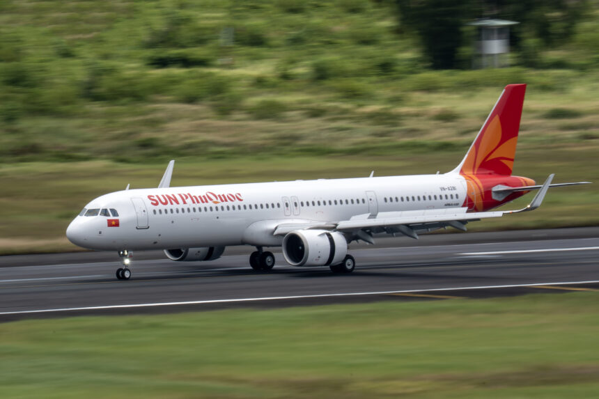 A Sun PhuQuoc Airways Airbus A321 on the runway.
