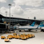 Guangzhou Baiyun International Airport view from outside with a China Southern aircraft.