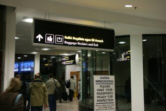 This image shows the sign inside the airport to the baggage reclaim