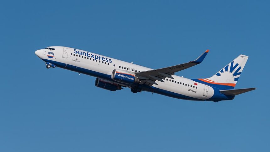 This image shows the SunExpress flight flying in the sky