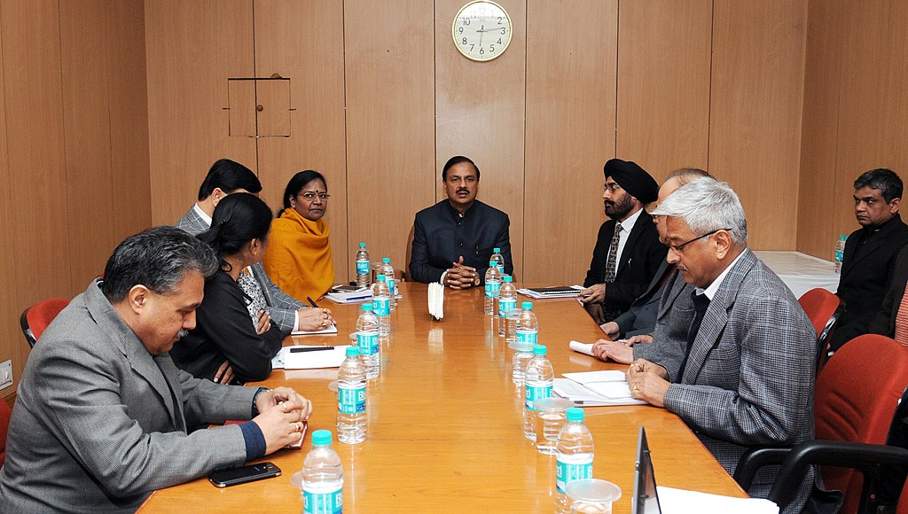 board room, eight people, meeting