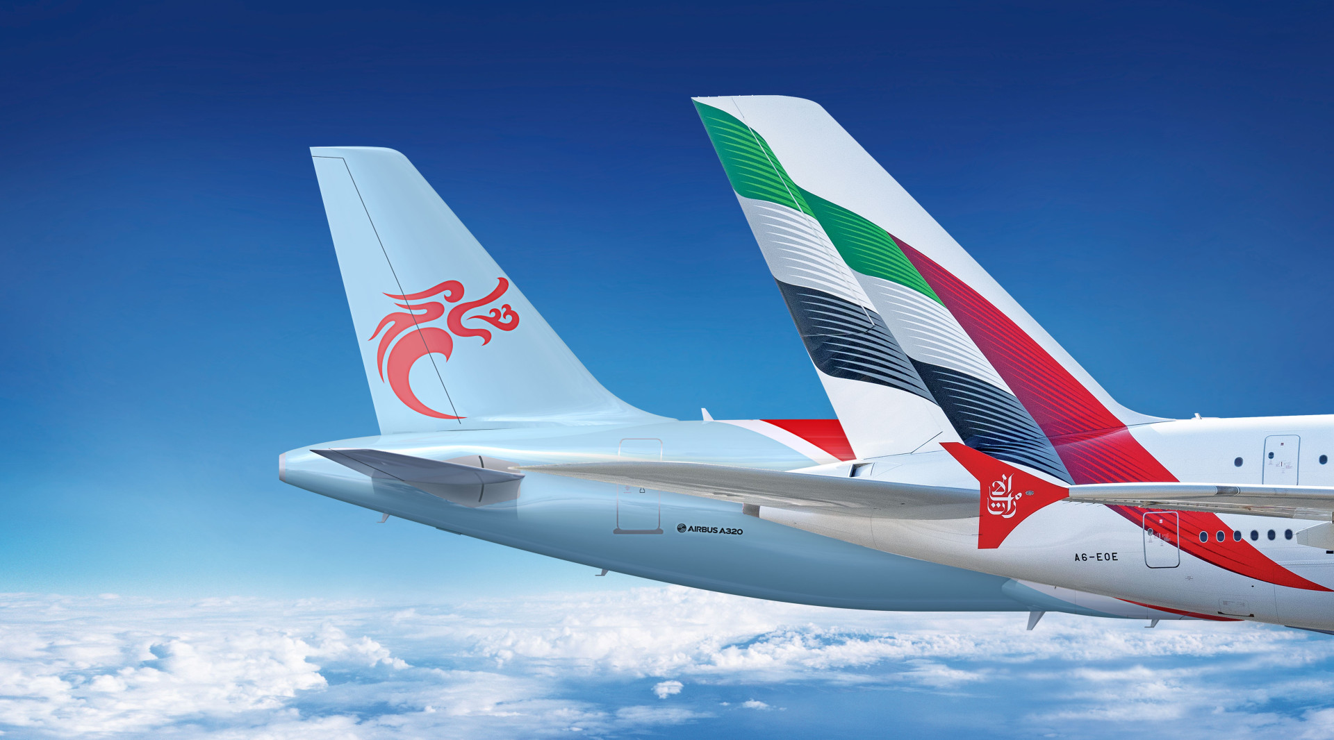 Emirates and Loong Air with their logos on tail of the aircraft