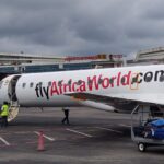 An Africa World Airlines Embraer 145 parked at the new international terminal at Roberts International Airport in Liberia