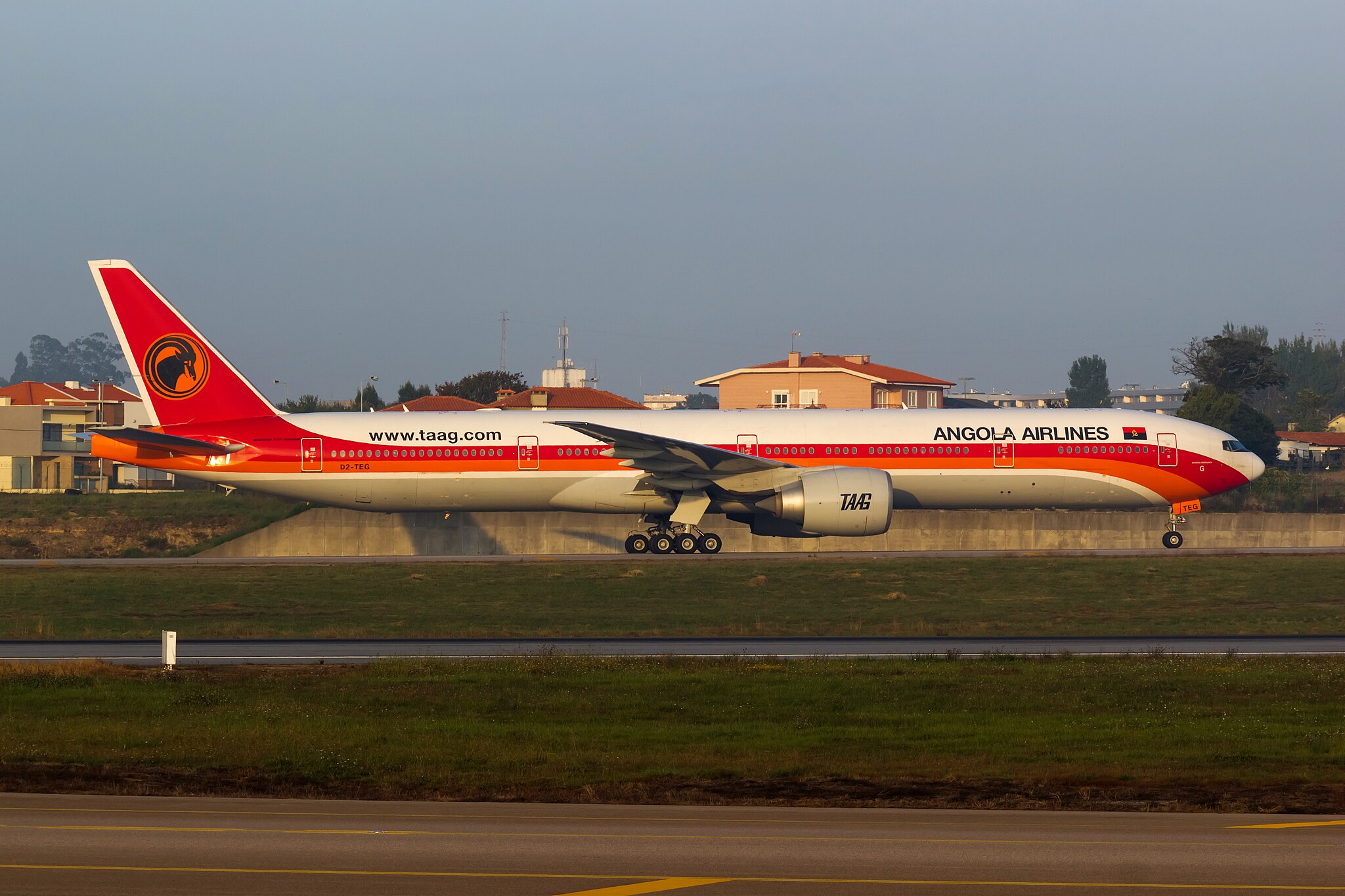  A Boeing 777 TAAG airlines aircraft on the runway.