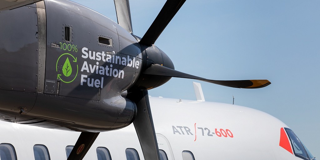 ATR 72-600 aircraft with "sustainable aviation fuel" written on the side.