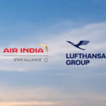 An image from the press release of the announcement of Lufthansa Group expanding their strategic partnership with Air India. the background is of a sunrise with the two airline logos floating in the middle.