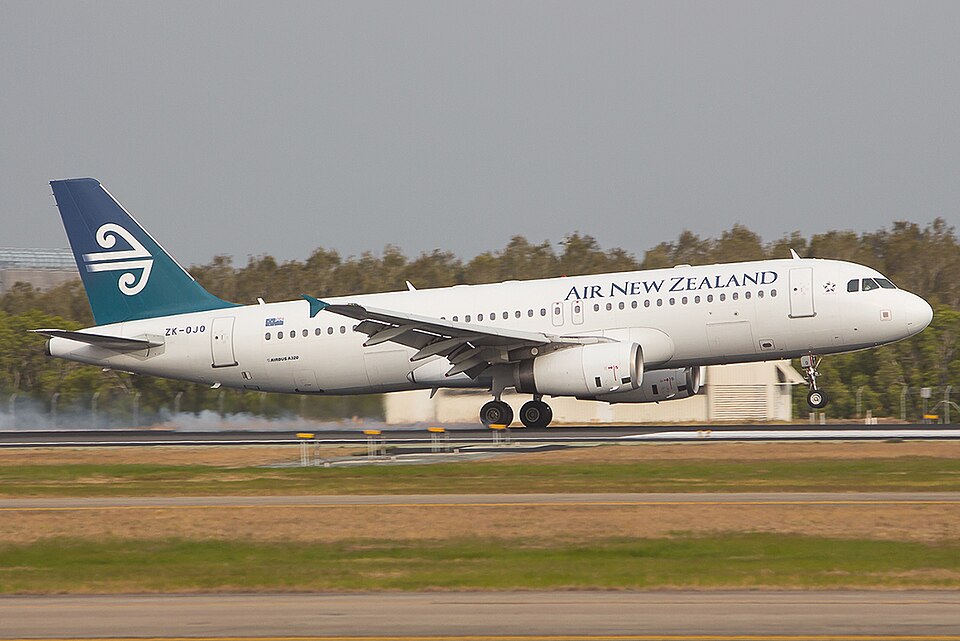 Air New Zealand Airbus A320 narrow-body aircraft parked on tarmac as long-haul cabin crew strike grounds widebody services.