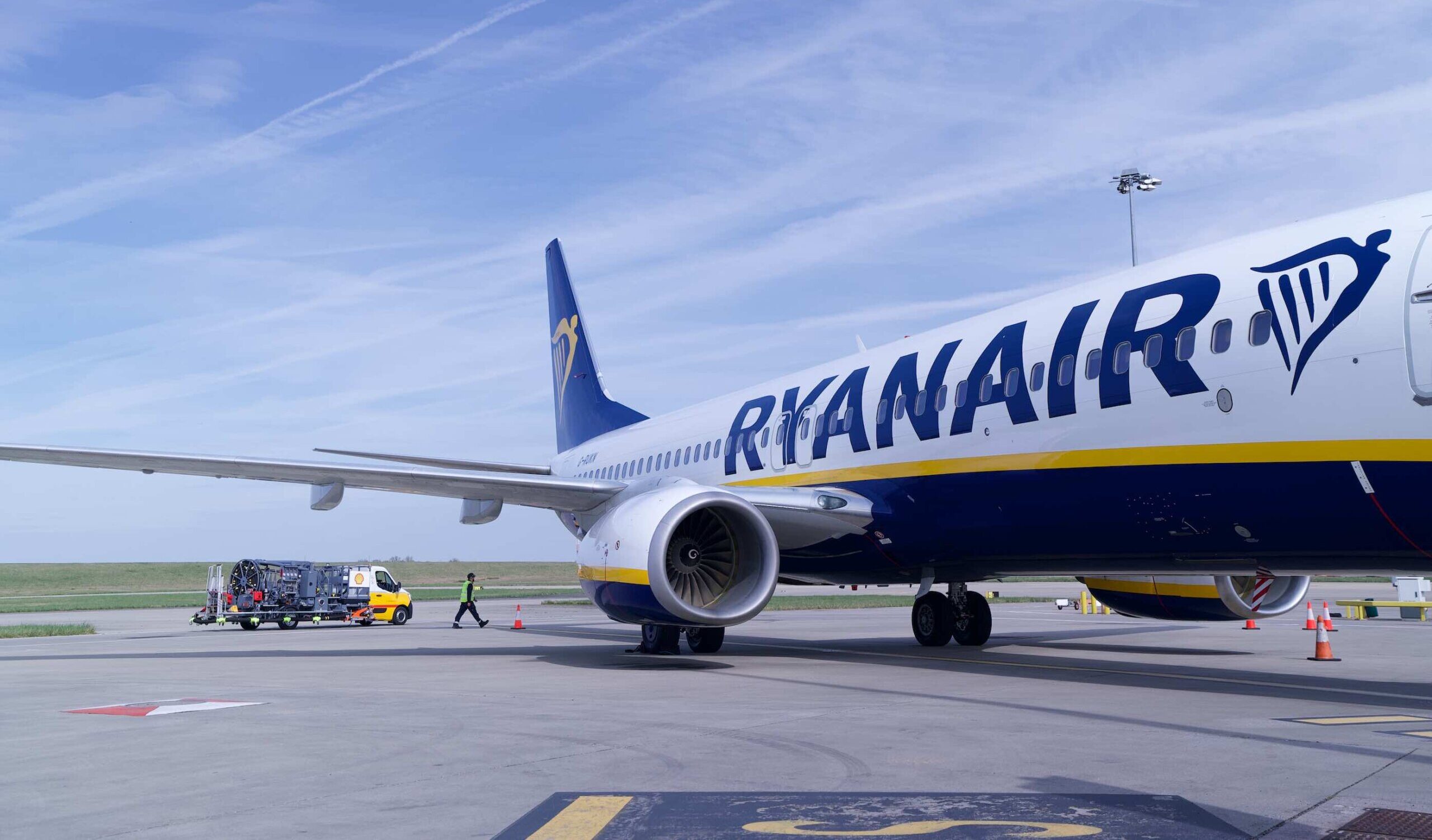 A Ryanair aircraft on the airport tarmac.