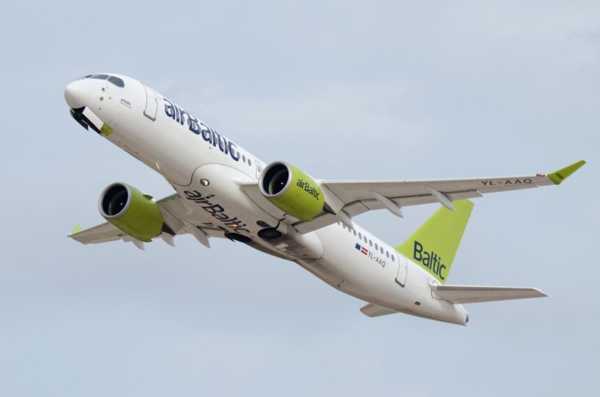 An airBaltic Airbus A220-300 in mid-flight.