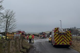 Rescue team at crash site in manchester