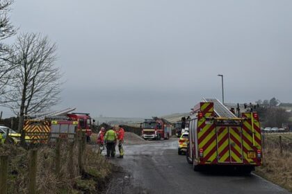 Rescue team at crash site in manchester